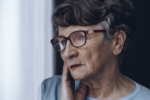 elderly woman on Medicare suffering from Alzheimer's Disease