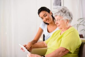 woman with medicare understanding plan non-renewal special enrollment notice with her agent