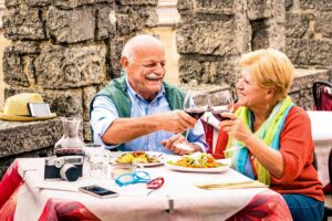 photo showing a senior couple enjoying their dining discount