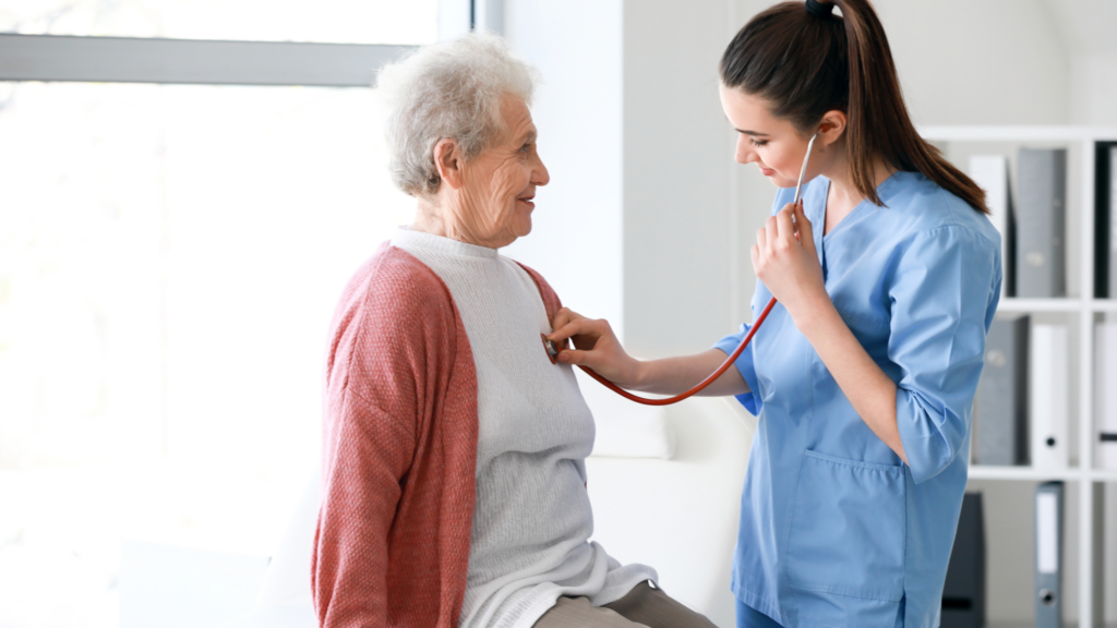 A medicare beneficiary in a doctors office getting a checkup from a provider