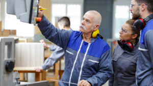 older man working in a factory