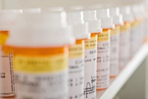 part d prescription bottles in a row.